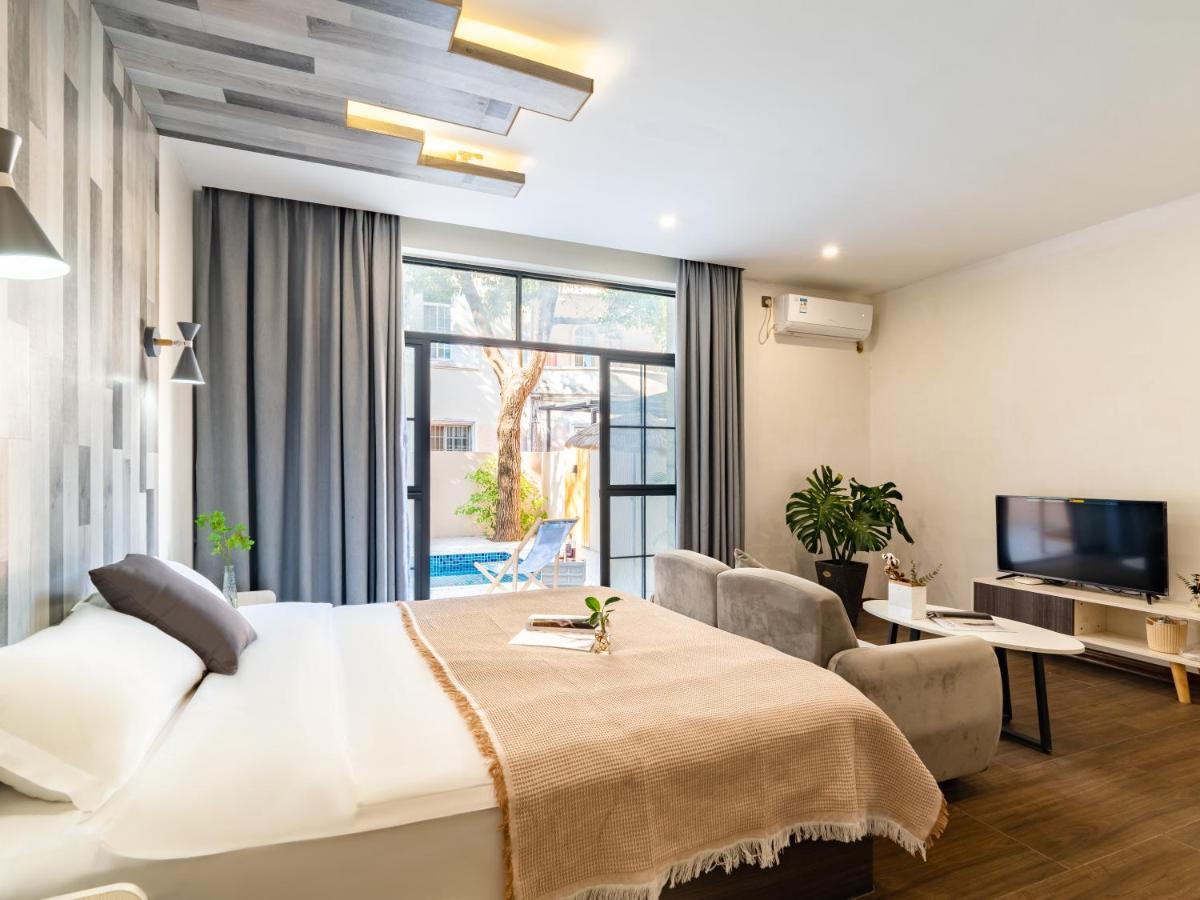 Beihai Silver Beach Yintai Time Seaview Villa Hotel Bagian luar foto