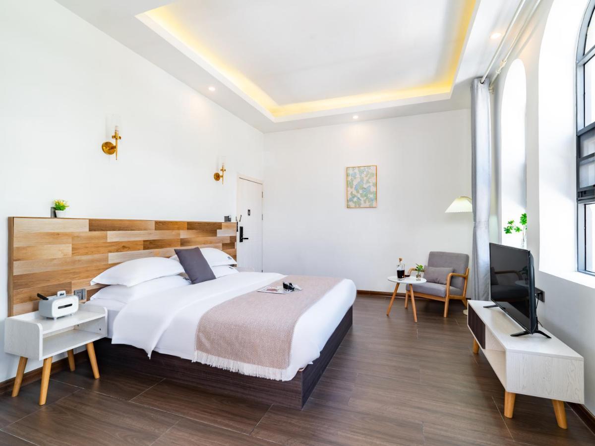 Beihai Silver Beach Yintai Time Seaview Villa Hotel Bagian luar foto